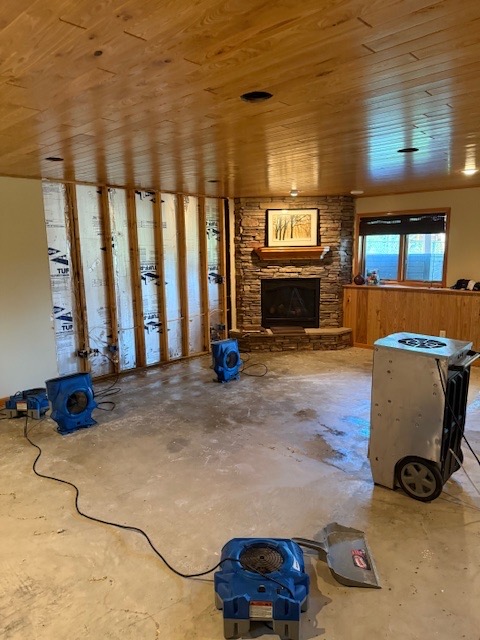 Water Damage Restoration - Professional Equipment in Living Area